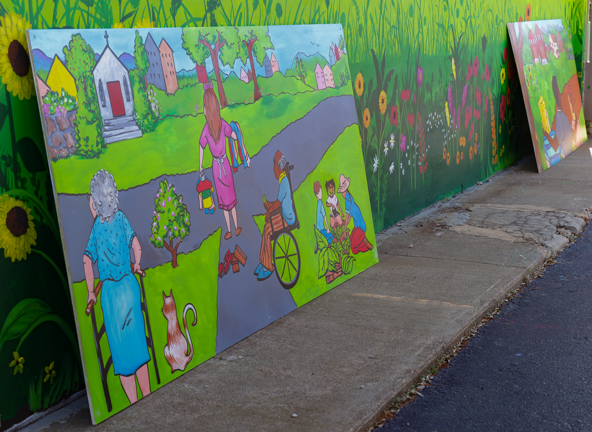 A panel from the newly installed mural on the United Way building. 