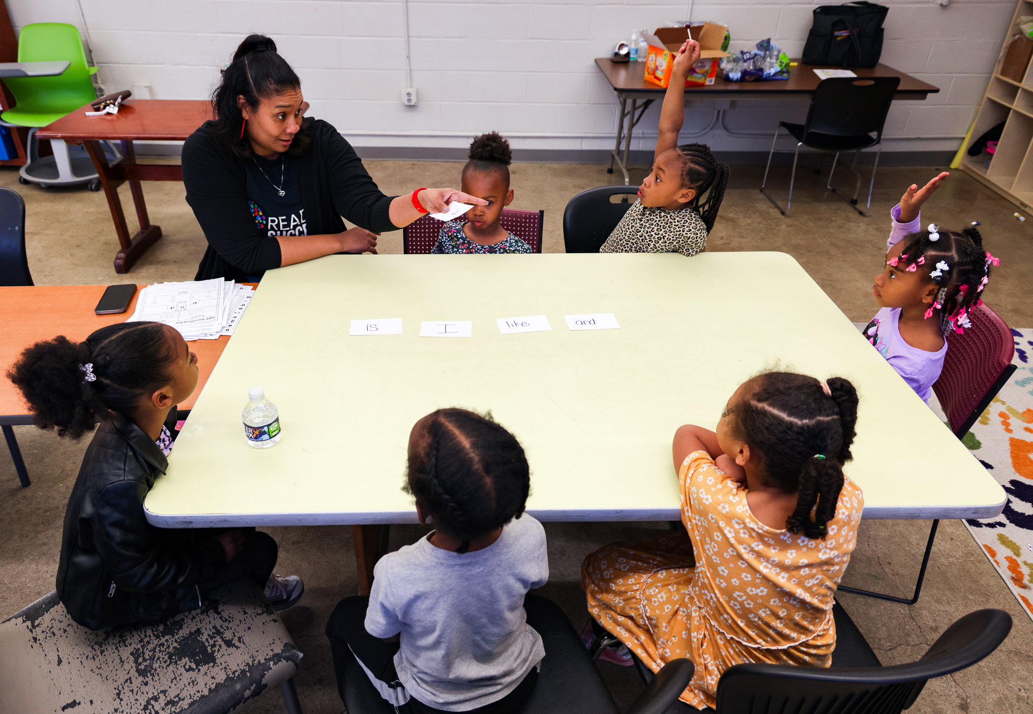 Ms. Hall conducts a group learning exersice at the PODS after school program at the Edington Center. 