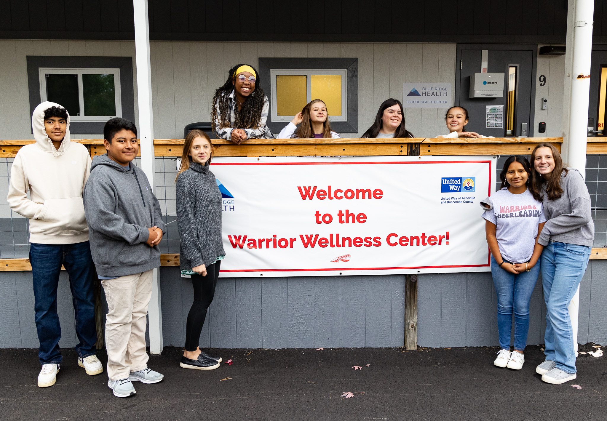 students stand in front of the Warrior Wellness Center in the Erwin District