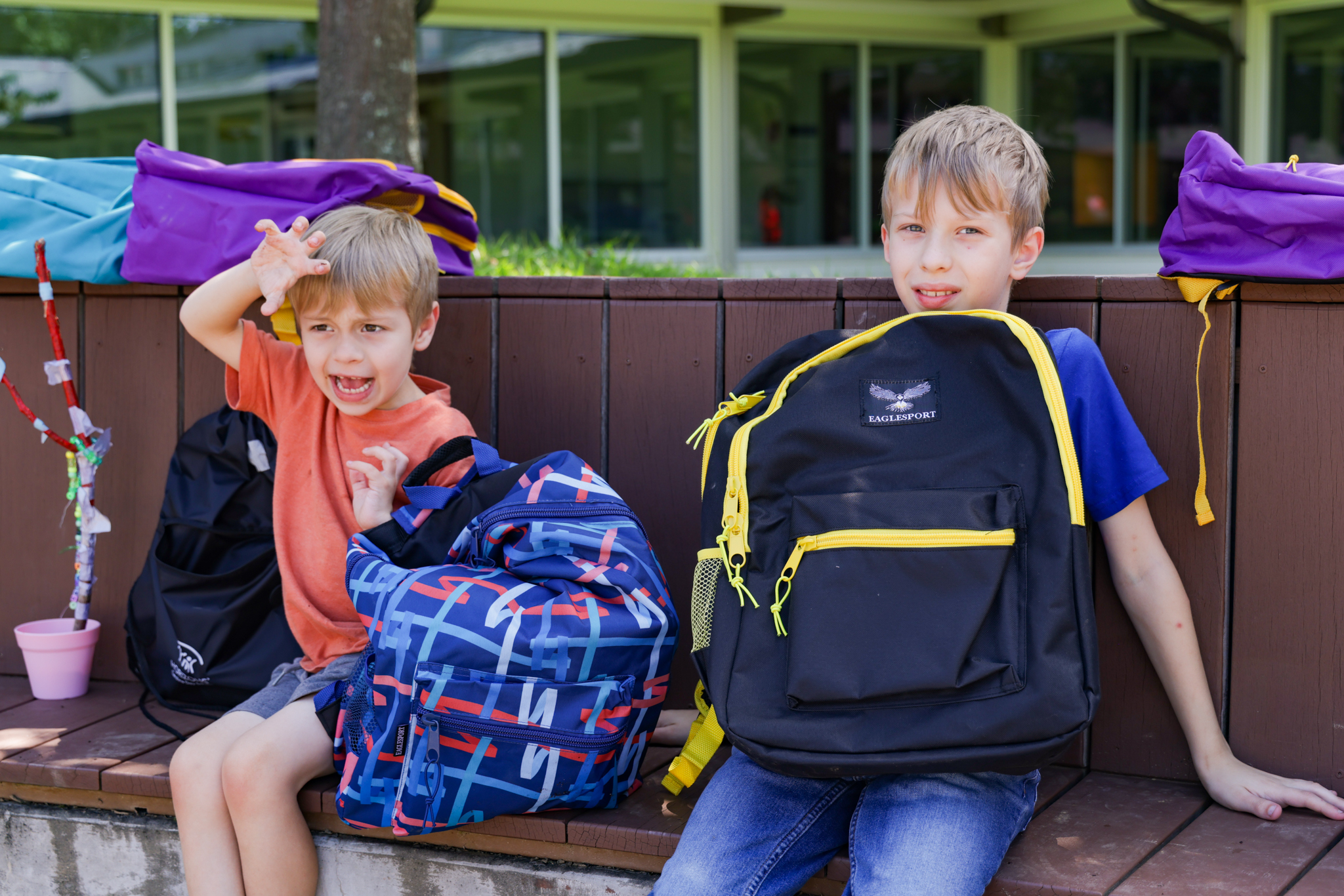 Two boys with their new backpacks