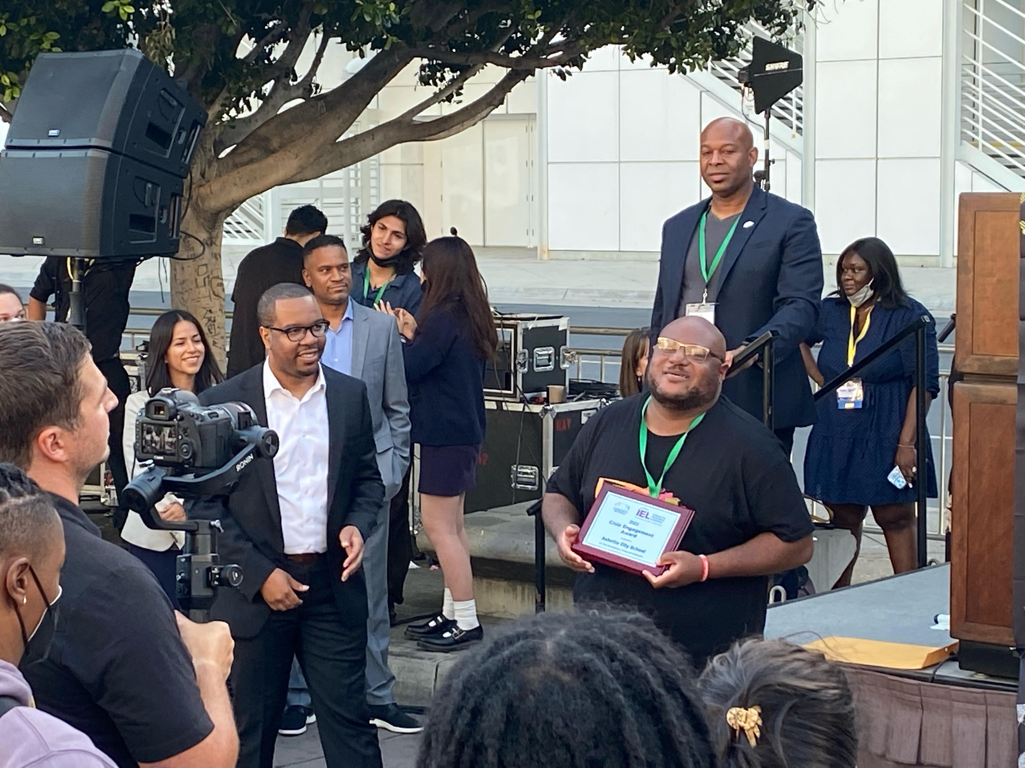 greg hall accepts award for ACSF