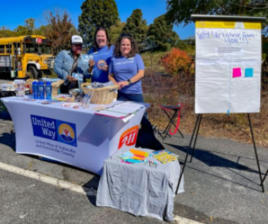 Calhoun and other UWABC staff at the Christine W. Avery Fall Festival. 