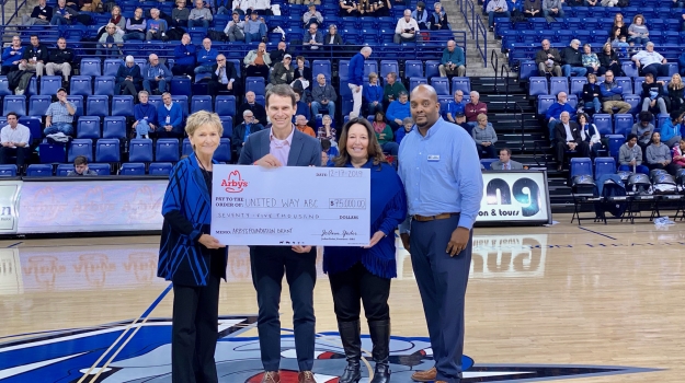 JoAnn Yoder, Janet Cone, Dan Leroy, Kevin Montgomery with check for $75K