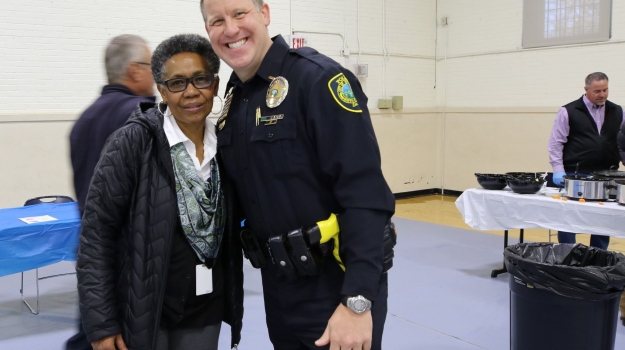 City Manager and UWABC Board Member, Deborah Campbell with officer at Chili Cookoff